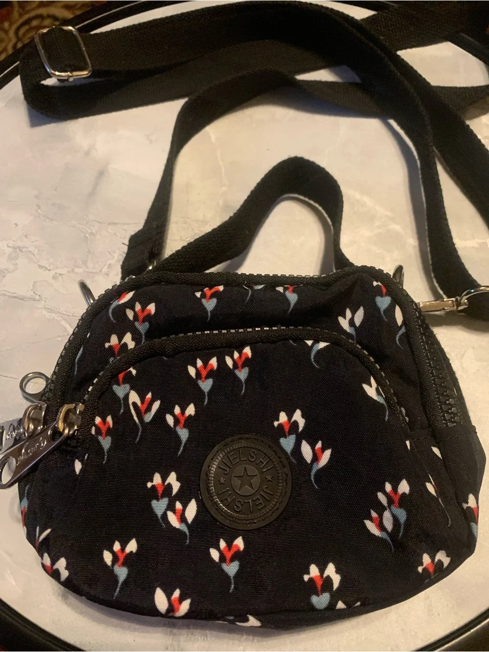 Jielshi Black Crossbody Bag with Red, White & Blue Floral Print